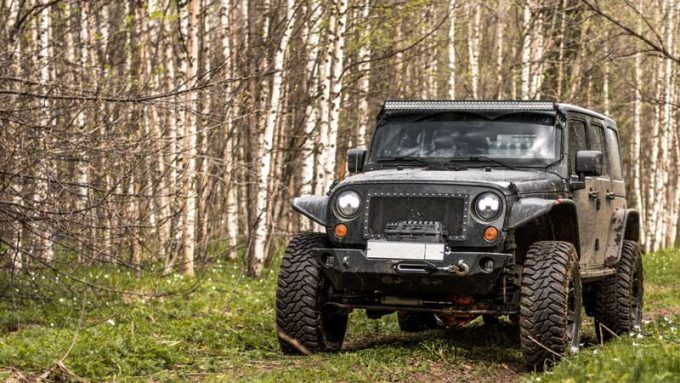 Off-road Jeep in a forrest