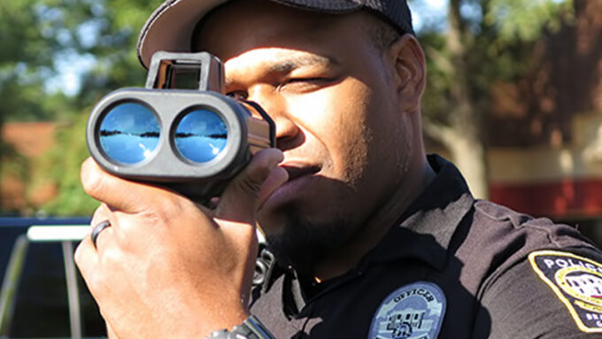 A cop with a detector