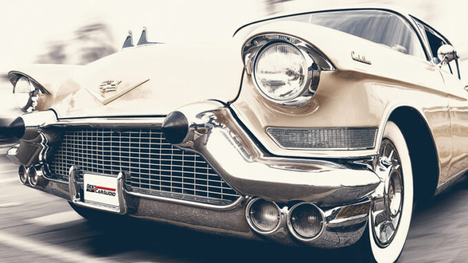 a beige colored classic car